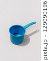 Blue Plastic Water Dipper on White Background Blue Plastic Water Dipper on White Background 129090196