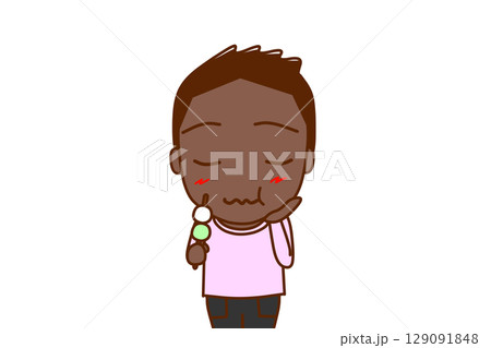 （上半身正面）三色団子を美味しく堪能し味わうアフリカ系少年 129091848