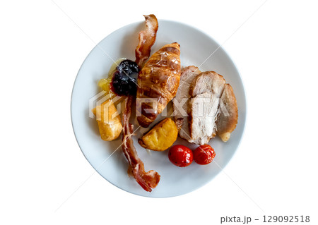 Simple breakfast in white ceramic dish isolated on white background with clipping path. Simple breakfast in white ceramic dish isolated on white background with clipping path. 129092518