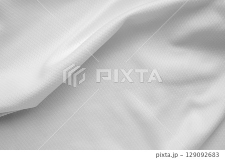 White sports clothing fabric football shirt jersey texture background White sports clothing fabric football shirt jersey texture background 129092683
