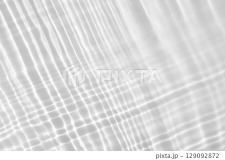 Abstract white transparent water shadow surface texture natural ripple background 129092872
