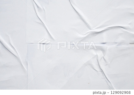 white crumpled and creased glued wrinkled paper poster texture background 129092908