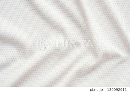 White sports clothing fabric football shirt jersey texture abstract background White sports clothing fabric football shirt jersey texture abstract background 129092911