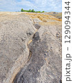 Tailings and waste sand  in  mined open pit coal quarry. Heavy erosion 129094344