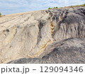 Tailings and waste sand  in  mined open pit coal quarry. Heavy erosion 129094346