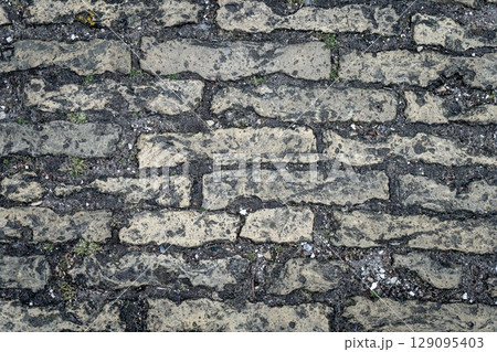 Red grunge brick wall, abstract background texture with old dirty and vintage style pattern 129095403