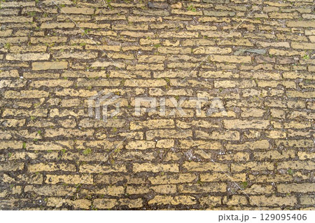 Red grunge brick wall, abstract background texture with old dirty and vintage style pattern 129095406