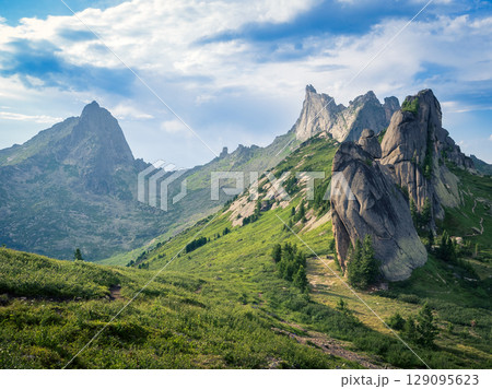 Mountain peak under the dramatic sky Mountain peak under the dramatic sky 129095623