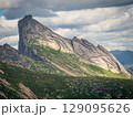 Mountain peak under the dramatic sky 129095626