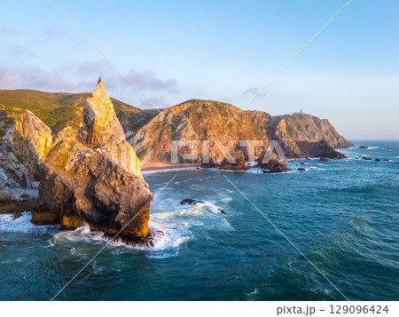 Ursa Beach, Cliffs and Atlantic Ocean Waves at Sunset. Portugal. Aerial View Ursa Beach, Cliffs and Atlantic Ocean Waves at Sunset. Portugal. Aerial View 129096424