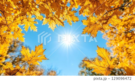 Bright blue abstract shape against orange blurred background Bright blue abstract shape against orange blurred background 129096472