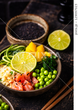 Healthy bowl with salmon and vegetables Healthy bowl with salmon and vegetables 129097023
