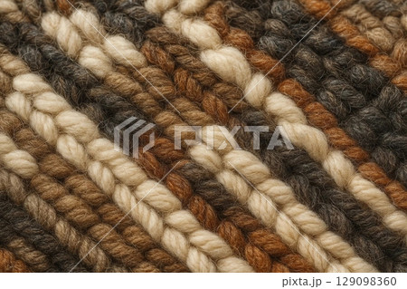 Close-Up of Knitted Fabric Featuring Diagonal Stripes Texture 129098360