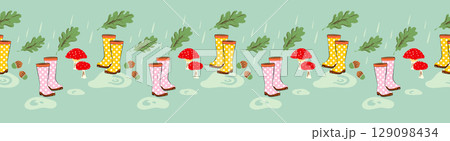 Cute rainy day seamless border pattern design with colorful rubber boots, red mushrooms, green oak leaves, and acorns. Autumn horizontal theme vector illustration 129098434