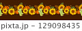 Autumn floral seamless border pattern with, sunflowers, oak tree leaves, pumpkins, acorns, and rubber boots. Harvest festival, Halloween or Happy Thanksgiving concept design. Seasonal horizontal 129098435