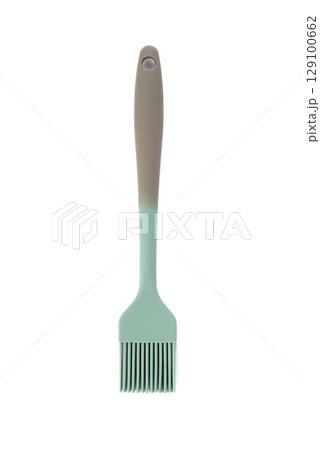 Flexible silicone cooking brush isolated on white background. 129100662