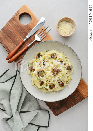 Mushroom pasta with cream parmesan cheese Mushroom pasta with cream parmesan cheese 129104694