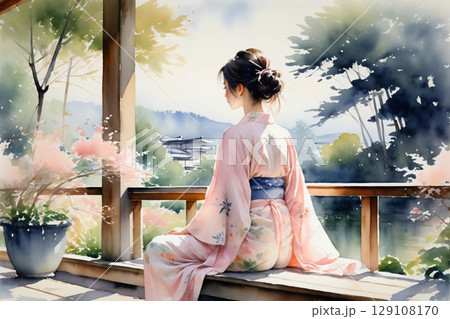 縁側に座ってくつろぐ浴衣姿の女性、和の風情漂う穏やかな午後 129108170