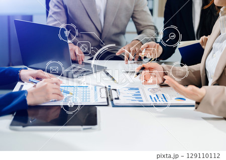 Working team meeting concept, business using laptop and smart phone and digital tablet computer with digital marketing media 129110112