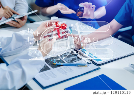 Medical technology network team meeting concept. Doctor hand working with smart phone modern digital tablet and laptop Medical technology network team meeting concept. Doctor hand working with smart phone modern digital tablet and laptop 129110119