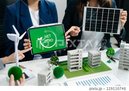 business team people planning and discussing on recycle reduce reuse policy symbol in office meeting room. business team people planning and discussing on recycle reduce reuse policy symbol in office meeting room. 129110748