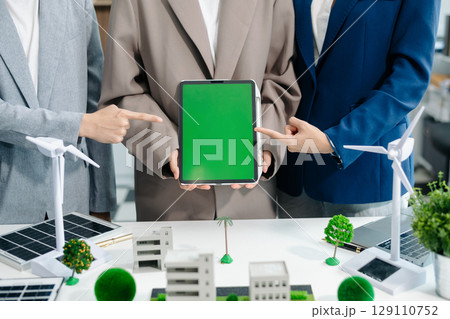 business team people planning and discussing on recycle reduce reuse policy symbol in office meeting room. 129110752