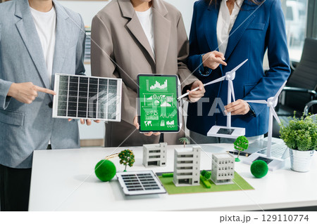 Business team people planning hand using laptop for working technology and business Net zero and carbon neutral concept.NET ZERO icons 129110774