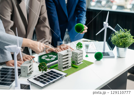 Business team people planning hand using laptop for working technology and business Net zero and carbon neutral concept.NET ZERO icons Business team people planning hand using laptop for working technology and business Net zero and carbon neutral concept.NET ZERO icons 129110777