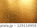 金色の和紙素材。お正月やお歳暮で使えそうな高級感のある金箔の背景素材。 129114958