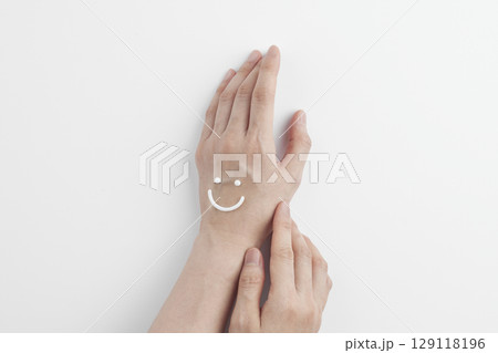 Skincare Beauty. Cosmetic cream texture for gentle moisturizing of healthy hands. Skincare Beauty. Cosmetic cream texture for gentle moisturizing of healthy hands. 129118196