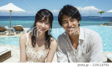 夏のビーチリゾート　バカンスを楽しむ男女2人 129118702