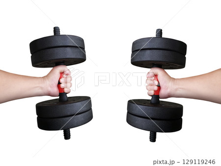 Dumbbells in two hands of a man isolated on white background. Dumbbells in two hands of a man isolated on white background. 129119246
