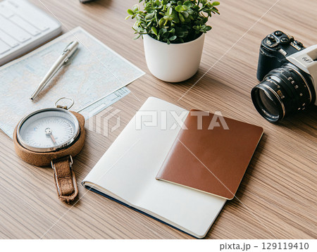 Flat lay passport and accessories like maps, compass, and tickets with vintage camera. AI Generated. 129119410