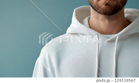 Close up of a man in a white sweatshirt with a hood. Mockup image. 129119567