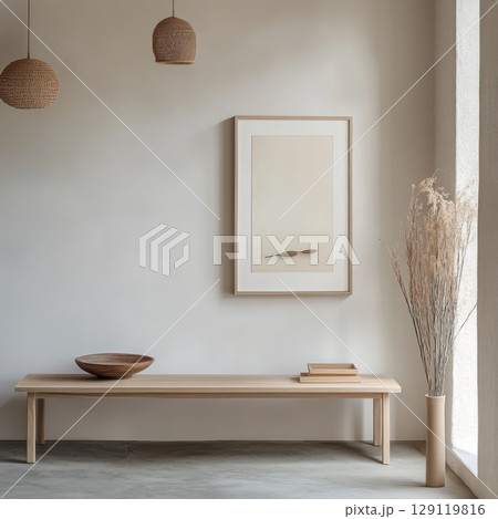 Interior of modern bathroom with beige walls, concrete floor, round wooden table and vertical mock up poster frame. 129119816