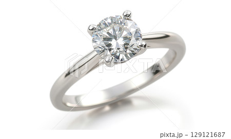 Beautiful ring with brilliant on a white background, close-up view. 129121687