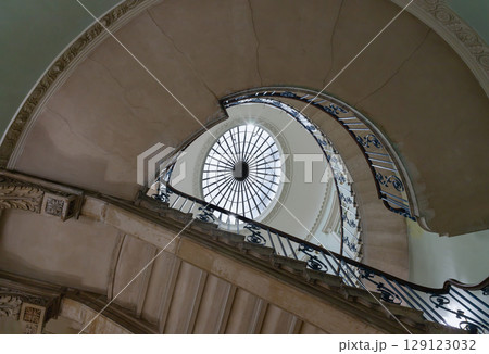 the Nelson Staircase within Somerset House in London, a grand spiral staircase inside a neoclassical building, 129123032