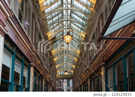 The spectacular victorian architecture of Leadenhall Market is housed beneath, is a combination of ornate wrought-iron, glass roof. The spectacular victorian architecture of Leadenhall Market is housed beneath, is a combination of ornate wrought-iron, glass roof. 129123035