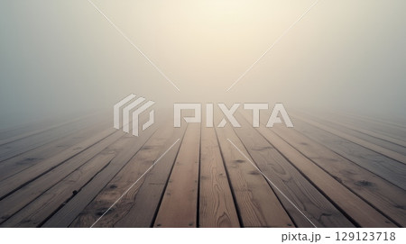 Wooden floor with foggy background and copy space. Rustic planks with natural texture for product display, design, or nature-themed concepts 129123718