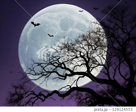 Spooky Full Moon with Silhouetted Tree and Flying Bats 129124553