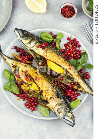 Aromatic fish baked in a berry marinade. 129124625