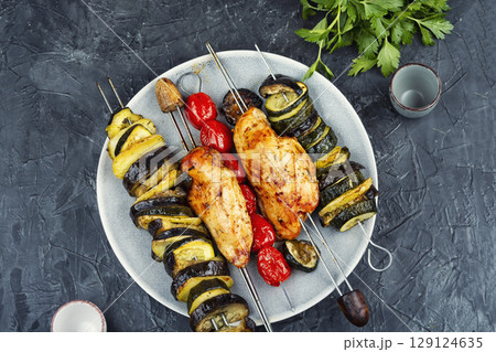 Chicken breast on skewers. Chicken breast on skewers. 129124635