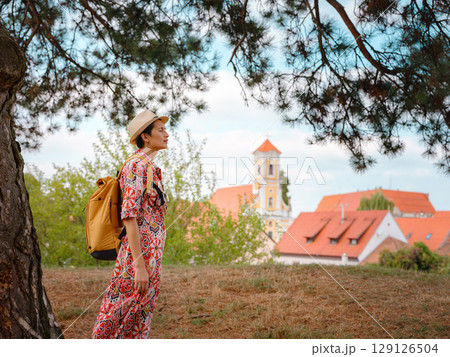 Woman Walking Through the Historic Center of Varazdin Woman Walking Through the Historic Center of Varazdin 129126504
