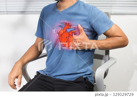 Heart pain visualized in a man chest with a medical graphic illustration. Heart pain visualized in a man chest with a medical graphic illustration. 129129729