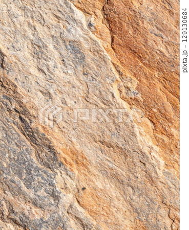 Detailed Rock Texture with Brown and Gray Minerals Displaying Natural Patterns 129130684