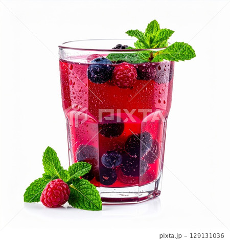 Red Berry Drink with Mint Garnish in a Clear Glass on a White Background Red Berry Drink with Mint Garnish in a Clear Glass on a White Background 129131036