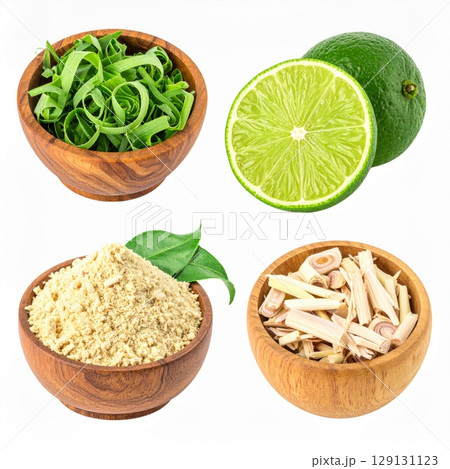 Assortment of Spices and Herbs Featuring Green Limes in Wooden Bowls 129131123