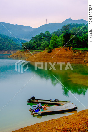 Serene Thousand Island Lake with Boats in Shiding New Taipei City Taiwan. 129132522