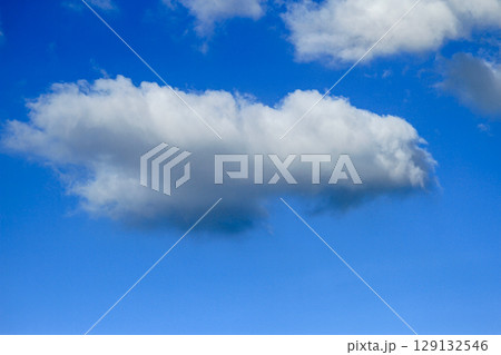Blue sky with white cloud above Longgang Harbor, Miaoli, Taiwan on a summer day. 129132546