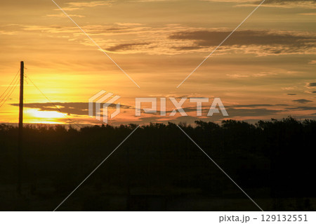 Golden Sunset over Longgang Miaoli Taiwan with Power Pole. 129132551